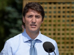 Canada's Prime Minister Justin Trudeau speaks about a watchdog's report that he breached ethics rules by trying to influence a corporate legal case regarding SNC-Lavalin, in Niagara-on-the-Lake, Ontario, Canada, August 14, 2019.