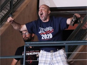 Trump supporter Frank Dawson cheers after helping to eject a small group of protesters during U.S. President Donald Trump's rally with supporters in Manchester, New Hampshire U.S. August 15, 2019. Dawson later affirmed in a television interview his support for Trump despite Trump apparently mistaking him for a protester and then disparaging his physical appearance. Picture taken August 15, 2019.