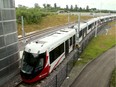 A file photo shows a train pulling into Cyrville Station during LRT testing in August.