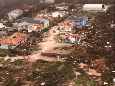 Aerial footage from Bahamas storm zone shows widespread destruction.
