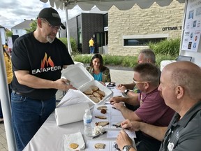 John Thomson shows off turkey entries at the Kosher BBC Competition at the Ottawa Torah Centre, Sept. 8, 2019