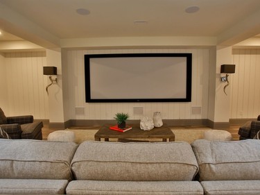 The main space downstairs is a large and comfortable media room with projection TV.