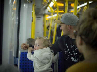 Day two of the light-rail transit had commuters and the general public out checking out the LRT system Sunday September 15, 2019. Two-year-old Annika Anderson watches out the window as she took a ride on the train with her family.