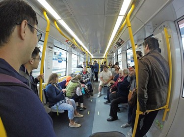 Passengers ride the train as the LRT is seen in operation on day 2 of the system up and running.