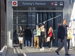 Commuters use the Tunney's Pasture LRT station on the first working day for the LRT on Monday, September 16, 2019.