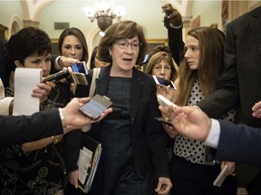 Sen. Susan Collins (R-ME) is surrounded by reporters following a closed-door meeting of Senate Republicans on Capitol Hill last September, about accusations against Supreme Court nominee Brett Kavanaugh.