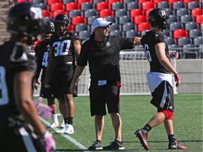 Noel Thorpe (white hat), defensive co-ordinator of the Ottawa Redblacks during their mini camp at TD Place in Ottawa, April 23, 2018.