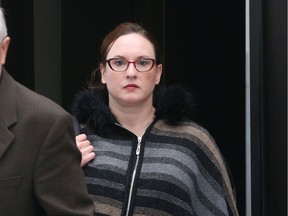 Rebecca Reid leaves the court house in Ottawa, June 05, 2019. She is accused of threatening MPP Lisa MacLeod.