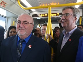 OC Transpo chair Allan Hubley and Mayor Jim Watson were all smiles at the LRT launch last month.
