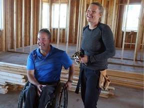 Emily Glossop and Todd Nicholson are rebuilding their home at 80 Porcupine Trail that was destroyed in the 2018 tornado, September 16, 2019.
