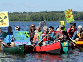 Three Green Party candidates and a couple of dozen supporters showed up at Westboro Beach on Thursday morning to protest the role of SNC-Lavalin, the federal government and two American companies planning a mound of nuclear waste near the Ottawa River.