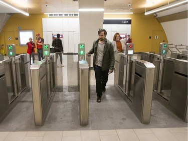 Passengers use the Lyon Station gateways as the LRT officially opens on September 14, 2019 complete with ceremonies at Tunney's Pasture.