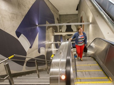 Sylvie Béland goes up the escalator at the Lyon Station as the LRT officially opens on September 14, 2019 complete with ceremonies at Tunney's Pasture.