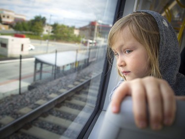 Day two of the light-rail transit had commuters and the general public out checking out the LRT system Sunday September 15, 2019. Four-year-old Elerie Anderson watches out the window of the train Sunday morning.