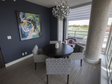 Jeff Hunt, co-owner of the Ottawa Redblacks, is selling his luxurious condo that overlooks TD Place. The dining area. P