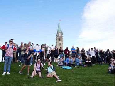 A large group on the edge of Parliament Hill as the Global Climate Protest took to the streets of Ottawa on Friday afternoon.