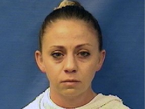 (FILES) In this file booking photo taken on September 10, 2018 shows Dallas Police Department officer officer Amber Guyger. - A white Texas cop who shot dead a black man in his own apartment, allegedly mistaking it for her own, was fired September 24, 2018 for "adverse conduct," the Dallas Police Department said. Police Chief U. Renee Hall terminated officer Amber Guyger's employment during in administrative hearing. Guyger is charged with manslaughter for killing Botham Shem Jean, an immigrant from the Caribbean nation of Saint Lucia. "An Internal Affairs investigation concluded that... (Guyger) engaged in adverse conduct when she was arrested for manslaughter," the department said.