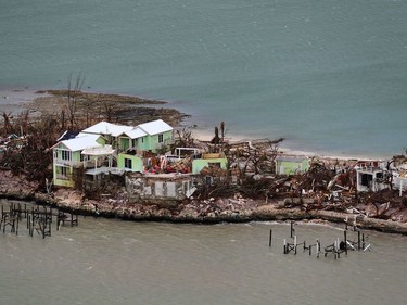 A handout aerial photograph released by the UK Ministry of Defence (MOD) on September 4, 2019 shows debris and destruction in the aftermath of Hurricane Dorian on the island Great Abaco in the northern Bahamas on September 3, 2019 during a reconnaissance mission launched by personnel onboard RFA Mounts Bay. - Bahamian, US and British teams ramped up rescue efforts on Wednesday for survivors of Hurricane Dorian, which caused widespread devastation as it pounded the Atlantic archipelago.