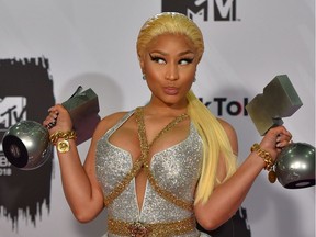 (FILES) In this file photo taken on November 04, 2018 Trinidadian-US rapper Nicki Minaj poses backstage with her awards during the MTV Europe Music Awards at the Bizkaia Arena in the northern Spanish city of Bilbao. - Nicki Minaj on September 5, 2019, surprised fans by announcing her retirement from rap, saying she was going to focus on family.