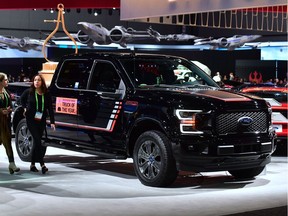 This file photo taken on November 30, 2017 shows Motor Trend magazine's 2018 Tuck of the Year, the Ford F150 Lariat Truck at the 2017 LA Auto Show in Los Angeles, California.