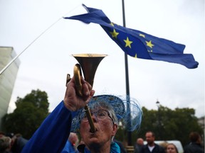 An anti-Brexit demonstrator protests outside the Houses of Parliament in London on Sept. 9.