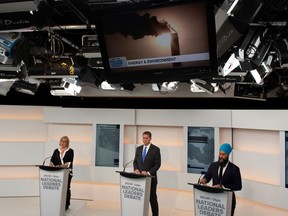 Green Party leader Elizabeth May, Conservative leader Andrew Scheer and New Democratic Party (NDP) leader Jagmeet Singh take part in the Maclean's/Citytv National Leaders Debate on the second day of the election campaign in Toronto, Ontario, Canada September 12, 2019.