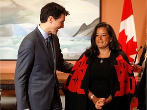 Justin Trudeau has contradicted many images Canadians have  of him. Here, he's show with Minister Jody Wilson-Raybould, who parted ways over SNC-Lavalin and is now running as an independent candidate.