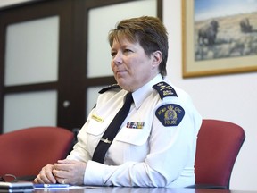 RCMP Commissioner Brenda Lucki sits for an interview in Ottawa on Friday, May 4, 2018. Lucki says the Mounties are assessing and trying to mitigate the possible damage that may have been caused in light of the arrest of one of its senior intelligence officials.