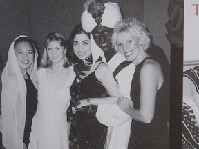 A photo showing Prime Minister Justin Trudeau, second from right, at a 2001 costume party - his hands and face blackened with makeup -- was published by Time Magazine Wednesday. They say it was published in the yearbook from the West Point Grey Academy, a private school in Vancouver, B.C., where Trudeau worked as a teacher before entering politics.