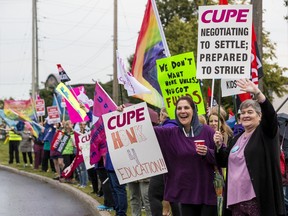 Education workers protest in front of the Ottawa Catholic School Board on Tuesday, Sept. 10, 2019.