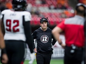 Redblacks head coach Rick Campbell walks on the sideline during the first half of a CFL football game against the B.C. Lions in Vancouver, on Friday September 13, 2019.