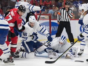 Toronto Maple Leafs [goalie Michael Hutchinson (30) makes a save in the second period against the Ottawa Senators at the Canadian Tire Centre.