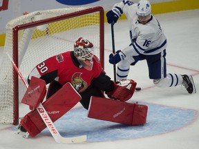 Toronto winger Andreas Johnsson (18) fans on the puck behind Ottawa goalie Filip Gustvasson in the third period of Wednesday's pre-season contest.