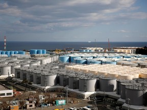 FILE PHOTO: Storage tanks for radioactive water are seen at Tokyo Electric Power Co's (TEPCO) tsunami-crippled Fukushima Daiichi nuclear power plant in Okuma town, Fukushima prefecture, Japan February 18, 2019. REUTERS/Issei Kato/File Photo ORG XMIT: TOK002