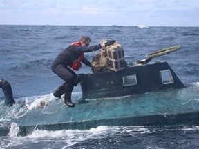 U.S. Coast Guard personnel intercepted a drug-laden, self-propelled semi-submersible in the Eastern Pacific. US Coast Guard photo.