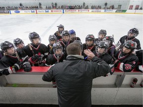 FILES:  Head coach Rob Ronberg talks to his team, the Nepean Wildcats in the Girls Atom AA division before playing against the Whitby Wolves as the annual Bell Capital Cup hockey tournament