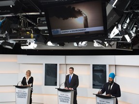 Green Party Leader Elizabeth May, left, Conservative Leader Andrew Scheer, centre, and NDP Leader Jagmeet Singh take part during the Maclean's/Citytv National Leaders Debate in Toronto on Thursday, September 12, 2019.