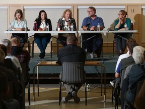 Participants in the Kanata-Carleton all-candidates meeting in Kinburn on Tuesday evening included, left to right, Conservative candidate Justina McCaffrey; NDP candidate Melissa Coenraad; Liberal candidate Karen McCrimmon; People's Party of Canada candidate Scott Miller; and Green Party candidate Jennifer Purdy.