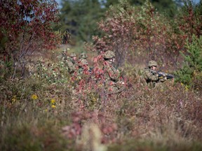Members from November Company, 3 Royal Canadian Regiment perform section attacks and urban drills as part of trialling for the new potential uniform pattern, 18 September 2019, Garrison Petawawa. Photo By: Aviator Melissa Gloude, Garrison Imaging Petawawa