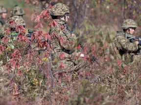Members from November Company, 3 Royal Canadian Regiment perform section attacks and urban drills as part of testing for the new potential uniform pattern. Photo By: Aviator Melissa Gloude, Garrison Imaging Petawawa