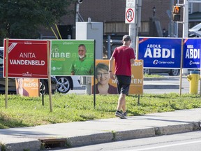 Election signs at the junction of Richmond Rd and Carling Avenue. Photo by Wayne Cuddington/Postmedia