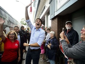 Liberal Leader Justin Trudeau is joined by Liberal candidate Kim Rudd as he makes a whistle stop in Cobourg, Ont., on Sunday, Sept. 15, 2019.