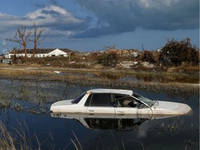 A flooded car is seen in the wake of Hurricane Dorian in Marsh Harbour, Great Abaco, Bahamas, September 7, 2019.