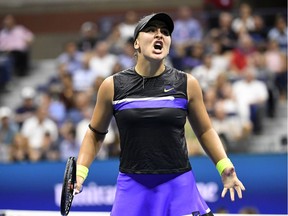 Bianca Andreescu reacts after winning a point against Elise Mertens of Belgium in the quarterfinals of the U.S. Open at the USTA Billie Jean King National Tennis Center.