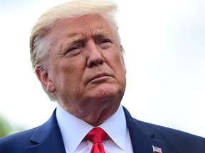 U.S. President Donald Trump speaks to reporters as he departs for travel to North Carolina from the White House in Washington, U.S., Sept. 9, 2019.