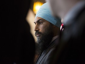 Jagmeet Singh, leader of the New Democratic Party (NDP), listens while speaking to members of the media at the House of Commons following tabling the federal budget in Ottawa, Ontario, Canada, on Tuesday, Feb. 27, 2018.