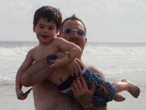 Lenny Pozner, with his son, Noah, who was killed in the 2012 massacre at Sandy Hook Elementary School in Newtown, Connecticut.