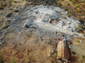 An aerial view taken on October 27, 2019 shows the site that was hit by helicopter gunfire which reportedly killed nine people near the northwestern Syrian village of Barisha in the Idlib province along the border with Turkey, where "groups linked to the Islamic State (IS) group" were present, according to a Britain-based war monitor with sources inside Syria.
