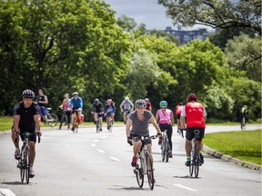 Cyclists enjoy the closed off Sir John A. Macdonald Parkway. File photo