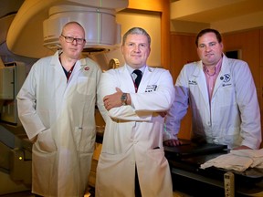 The team involved in pioneering a new procedure that, instead of open heart surgery, fixes a deadly heart arrhythmia with a non-invasive procedure that takes only minutes includes Professor of Cardiology Dr. Andrew Crean, Associate Professor of Cardiology Dr. Calum Redpath and Radiation Oncologist Dr. Graham Cook.